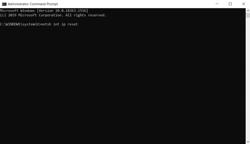 A Windows command prompt with the command "netsh int ip reset" entered.