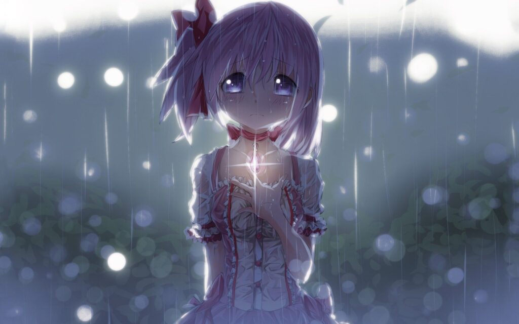 Cô gái khóc một mình dưới mưa