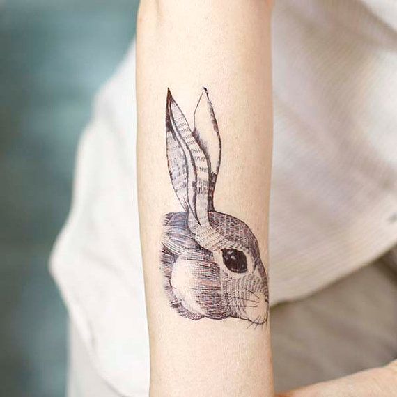 Xăm tattoo đầu thỏ đẹp ở tay